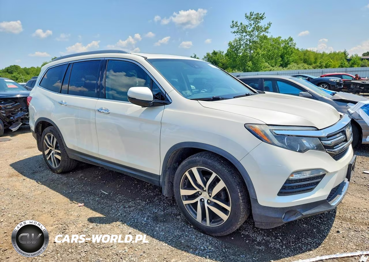 2016 Honda Pilot Elite VIN:5FNYF6H00GB064317 - 4