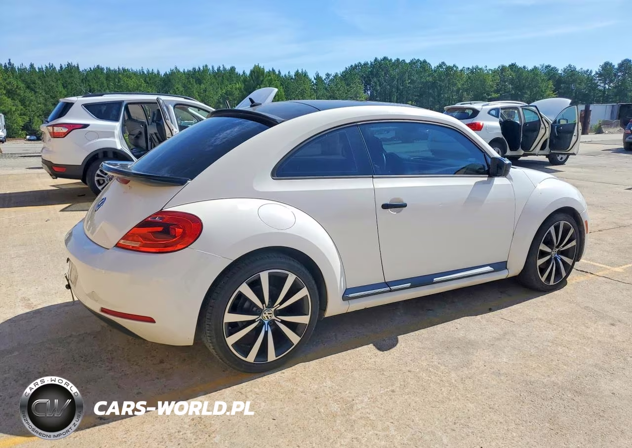 2012 Volkswagen Beetle VIN:3VWFP7AT4CM615754 - 3