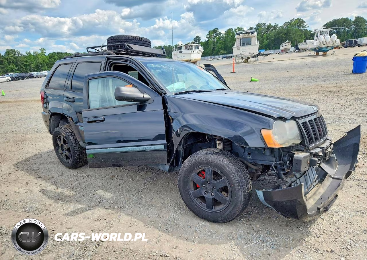 2009 Jeep Grand Cherokee Laredo VIN:1J8GR48K09C542253 - 4