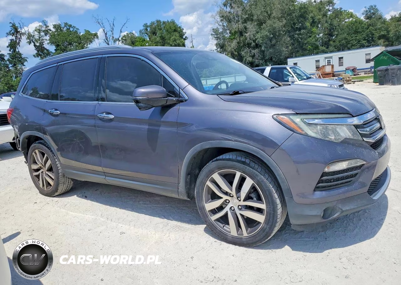 2017 Honda Pilot Touring VIN:5FNYF6H92HB073617 - 4