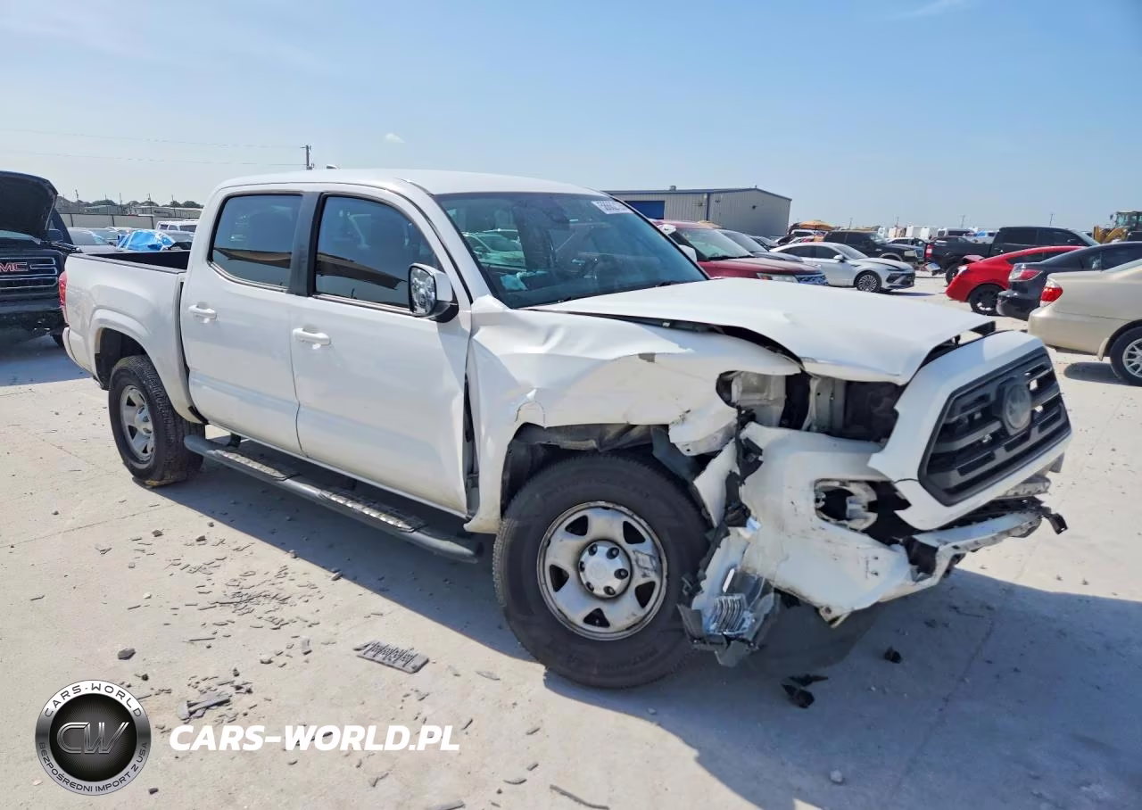 2018 Toyota Tacoma Sr VIN:5TFAX5GN0JX112241 - 4