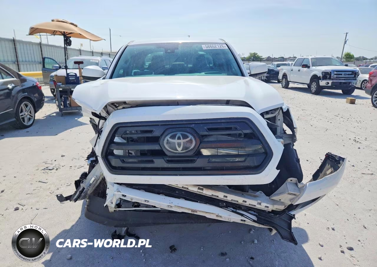 2018 Toyota Tacoma Sr VIN:5TFAX5GN0JX112241 - 5