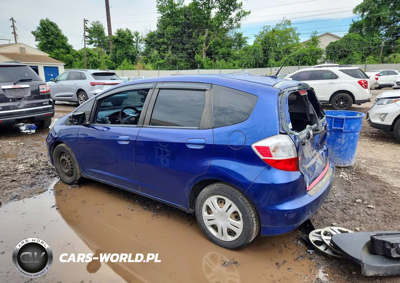 2009 Honda Fit VIN:JHMGE882X9S056497 - 2