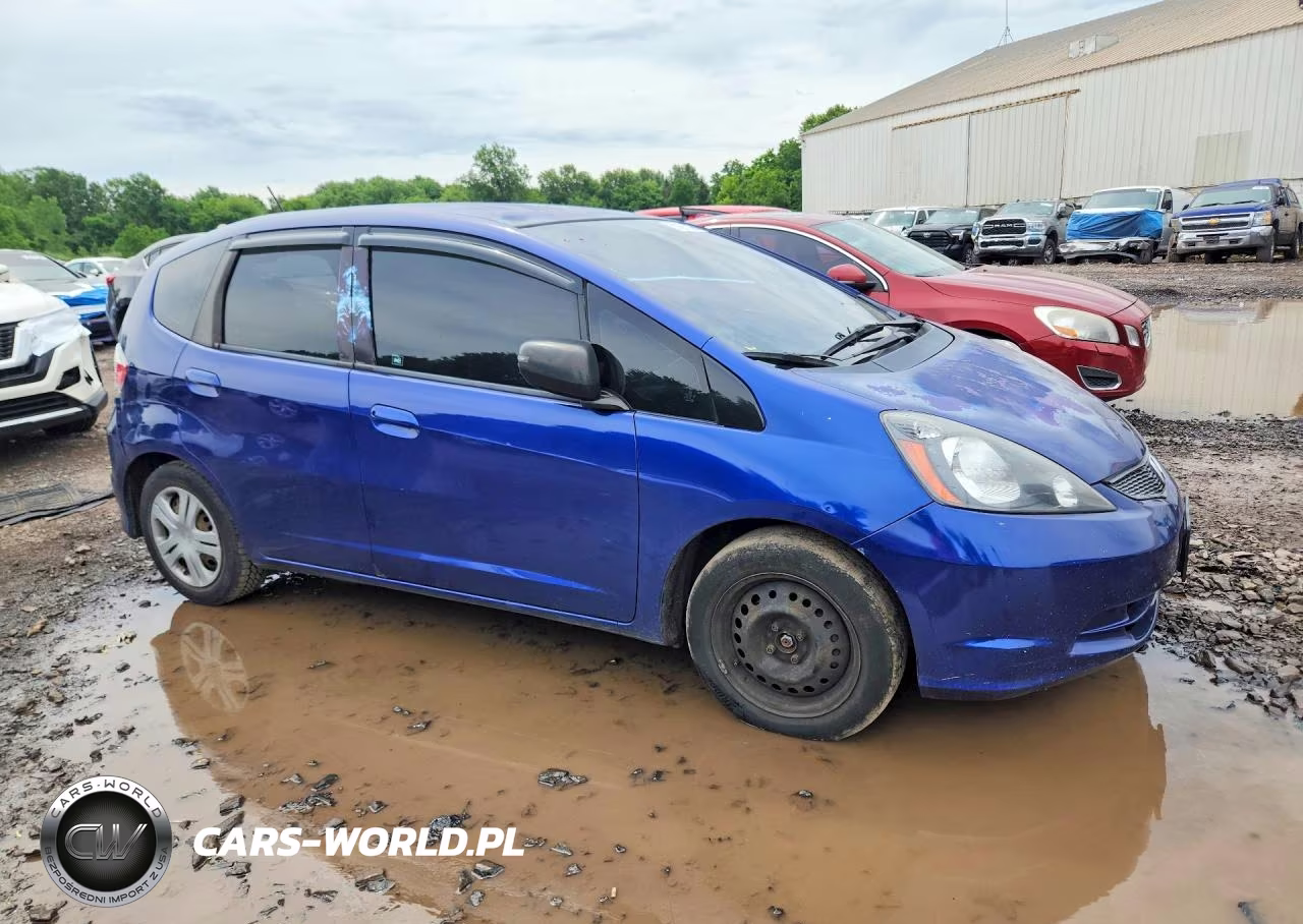 2009 Honda Fit VIN:JHMGE882X9S056497 - 4