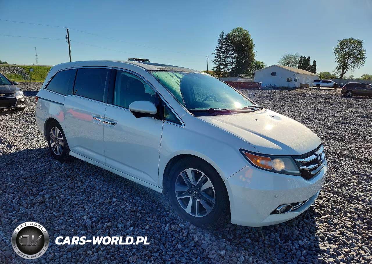 2014 Honda Odyssey Touring VIN:5FNRL5H98EB070157 - 4