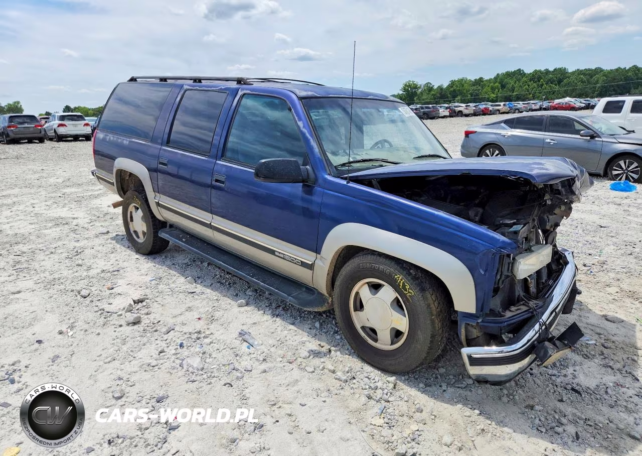 1999 GMC Suburban K1500 VIN:1GKFK16R4XJ802673 - 4