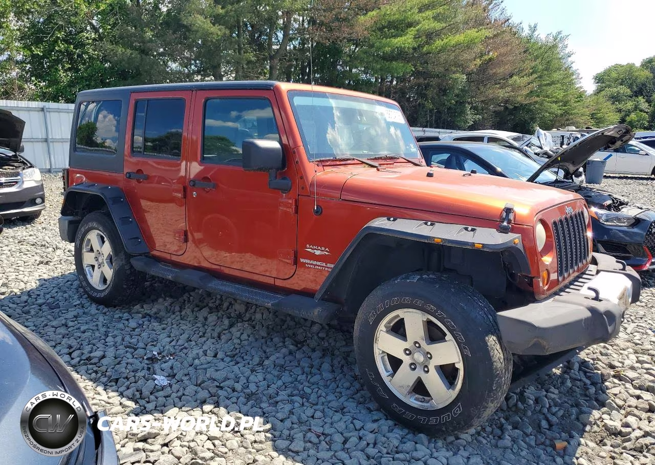 2009 Jeep Wrangler Unlimited Sahara VIN:1J8GA59149L711158 - 4