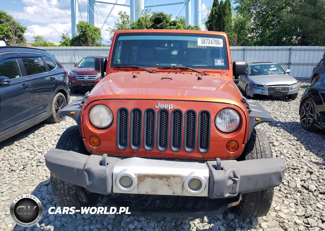 2009 Jeep Wrangler Unlimited Sahara VIN:1J8GA59149L711158 - 5