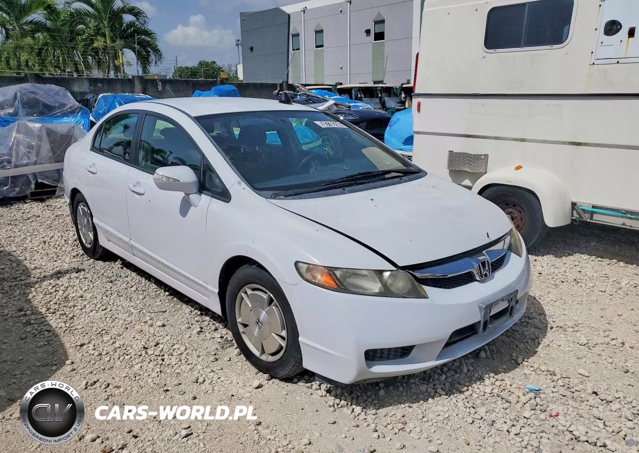 2011 Honda Civic Hybrid VIN:JHMFA3F25BS000129 - 4