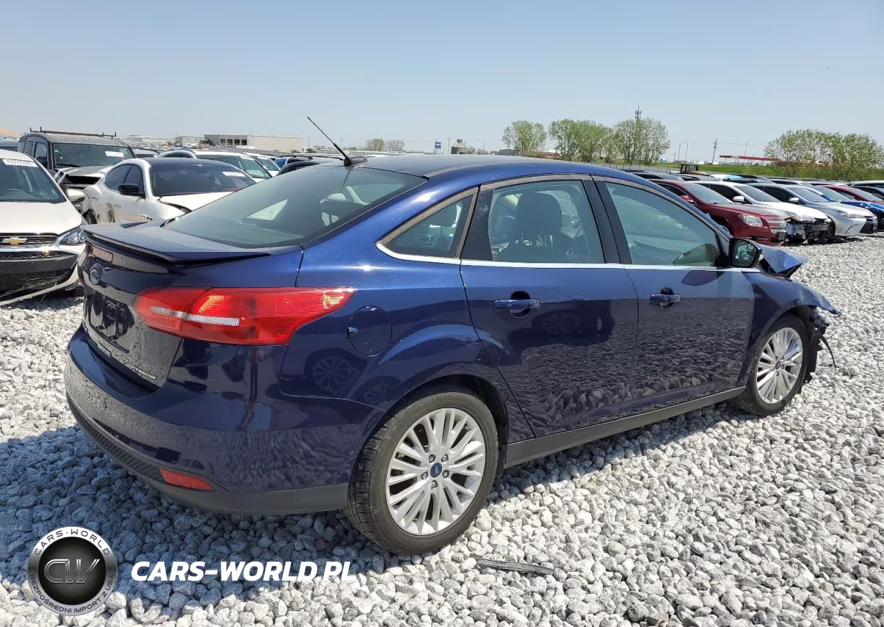 2017 Ford Focus Titanium VIN:1FADP3J24HL210714 - 3