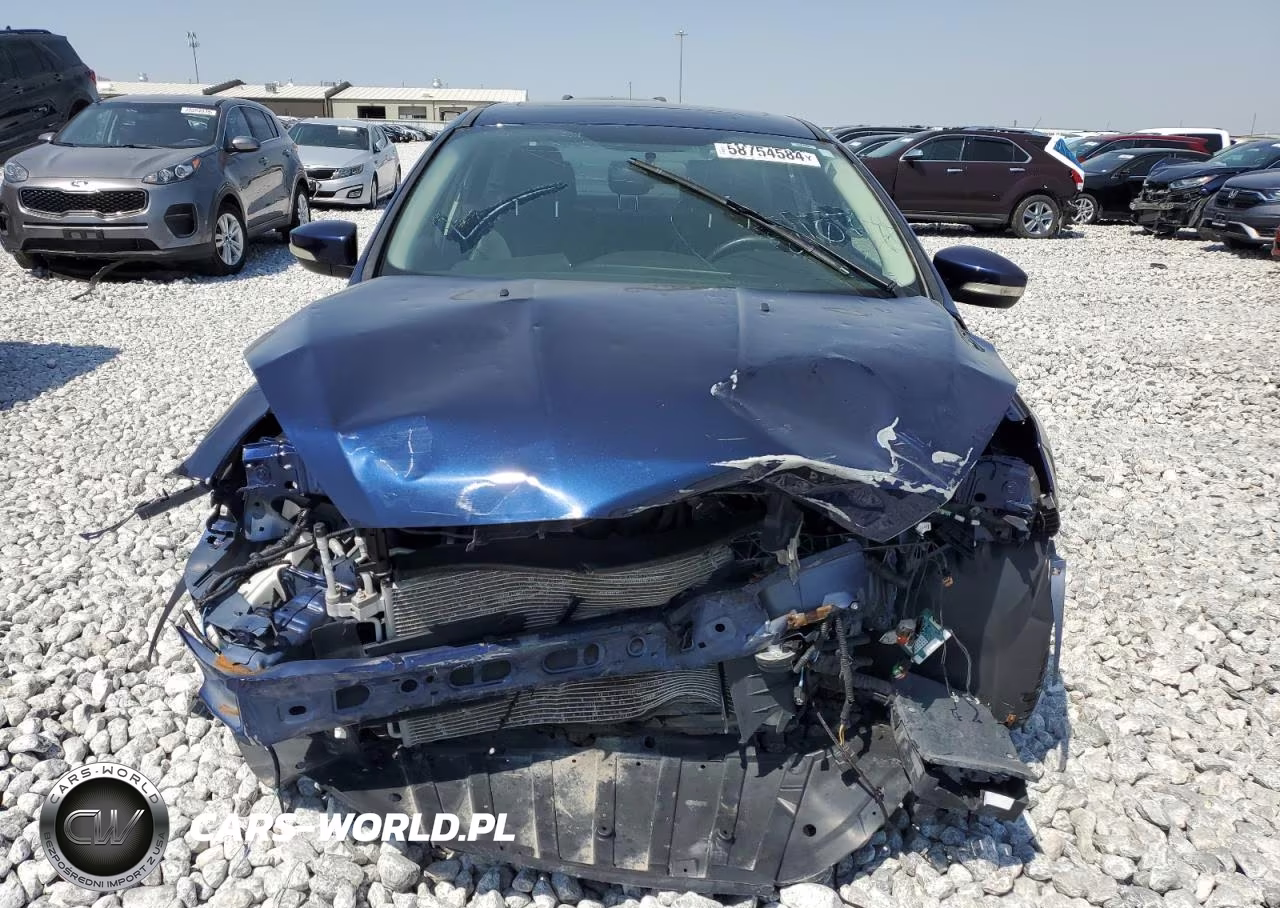 2017 Ford Focus Titanium VIN:1FADP3J24HL210714 - 5