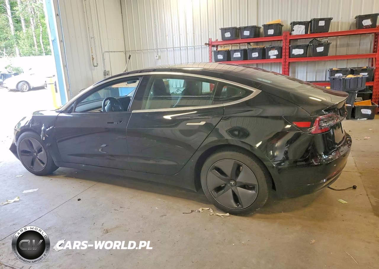 2018 Tesla Model 3 VIN:5YJ3E1EB9JF182203 - 2
