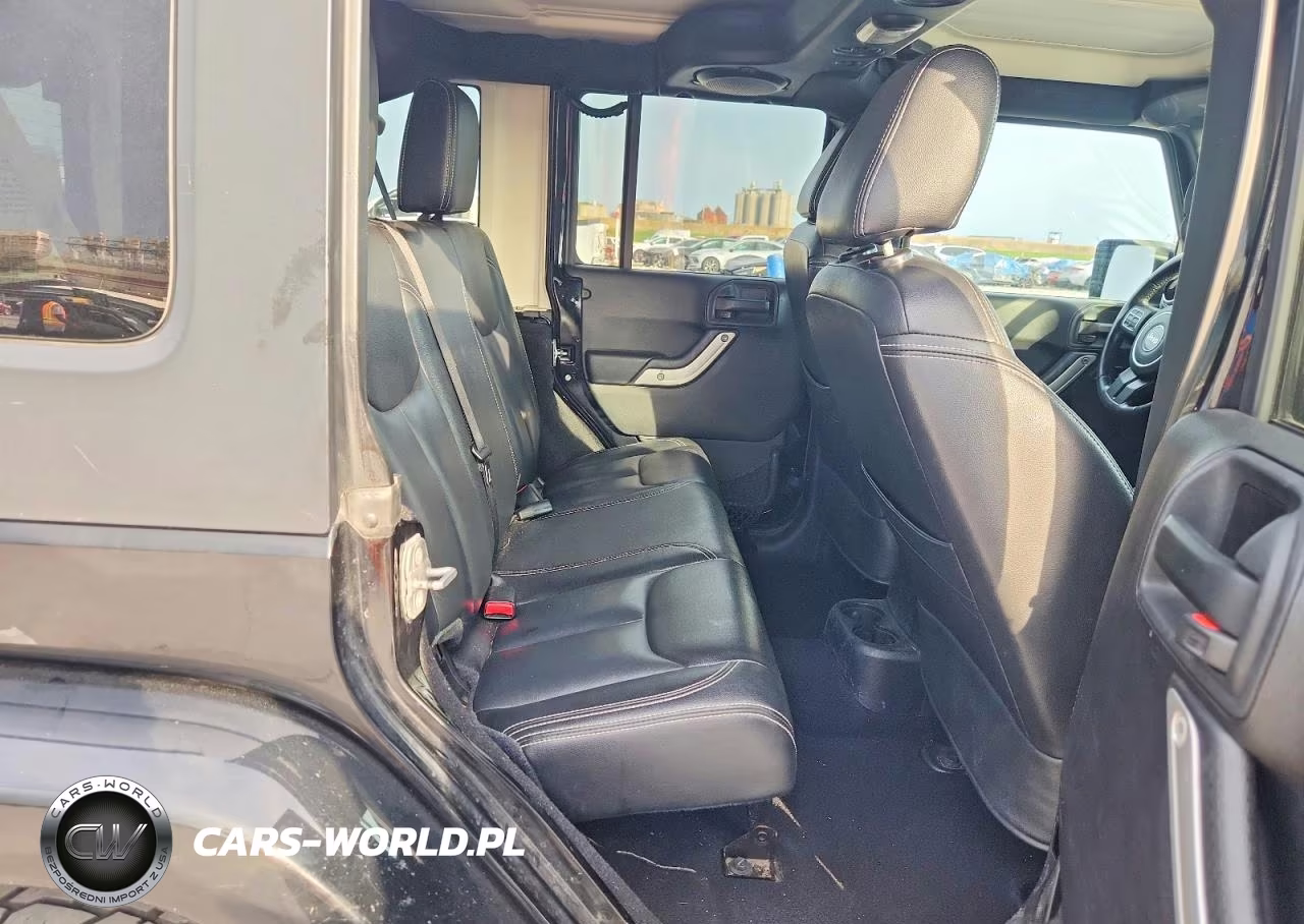2014 Jeep Wrangler Unlimited Sahara VIN:1C4BJWEG9EL305419 - 11