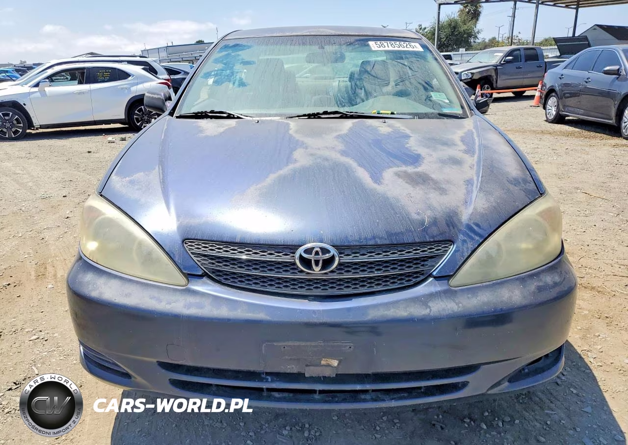2002 Toyota Camry Le VIN:JTDBE32K020018124 - 5