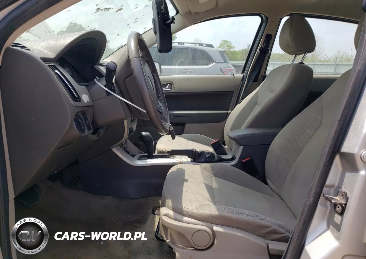 2009 Ford Focus VIN:1FAHP36N59W168929 - 7