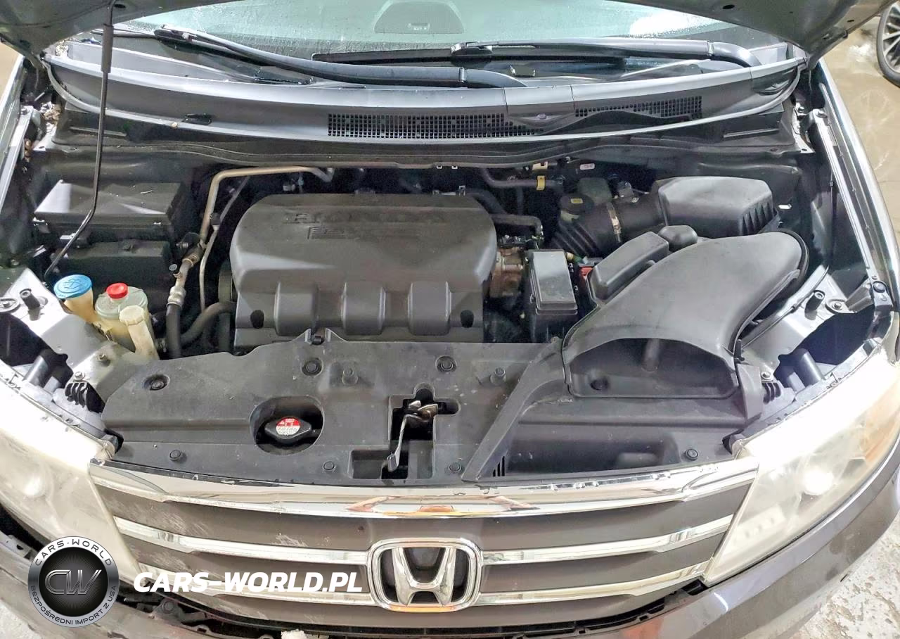 2012 Honda Odyssey Touring VIN:5FNRL5H97CB027622 - 12