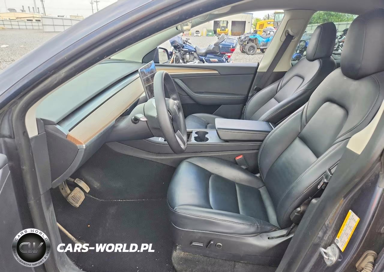 2023 Tesla Model Y VIN:7SAYGDEE0PF596512 - 7