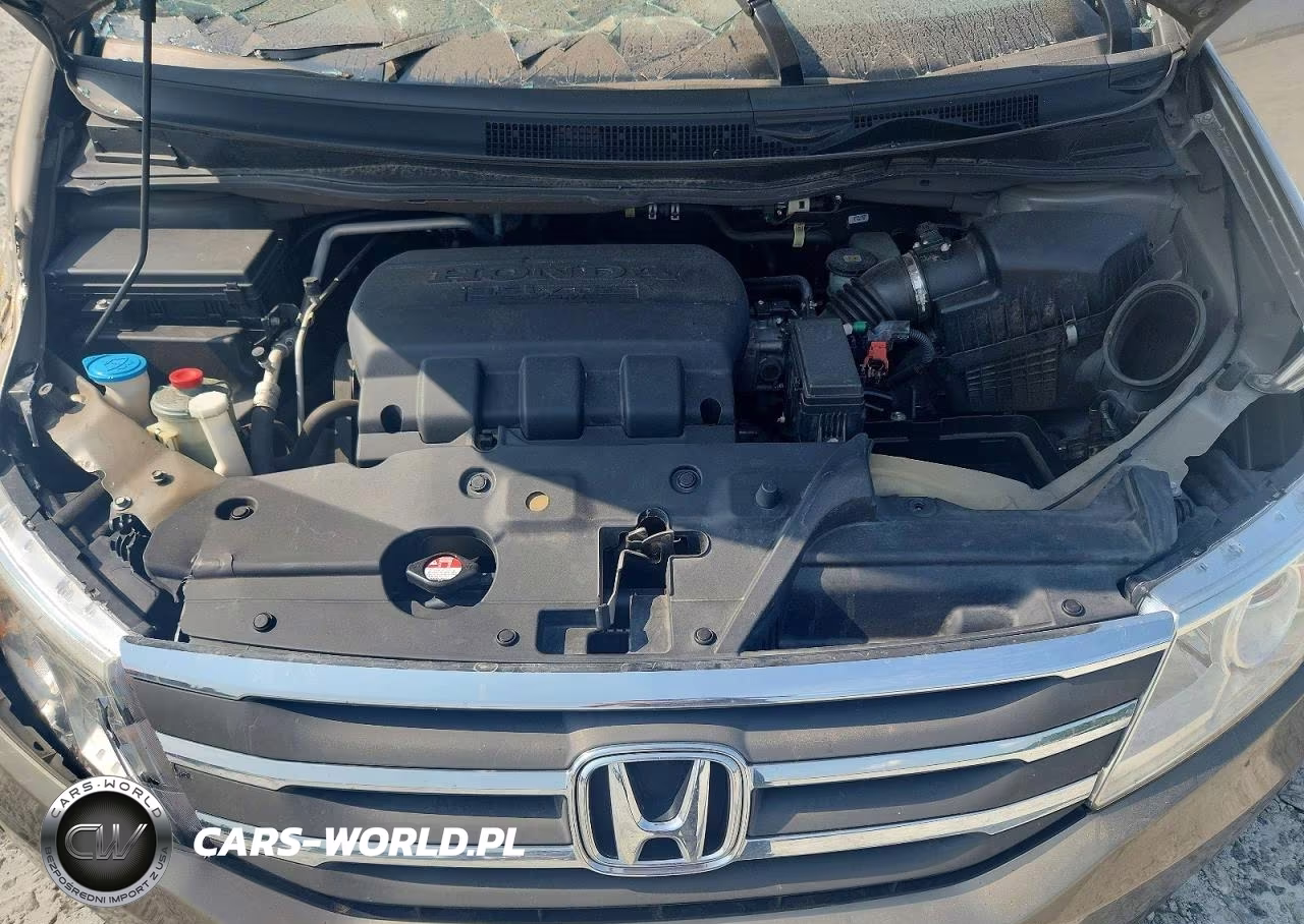 2011 Honda Odyssey Touring VIN:5FNRL5H96BB030011 - 12