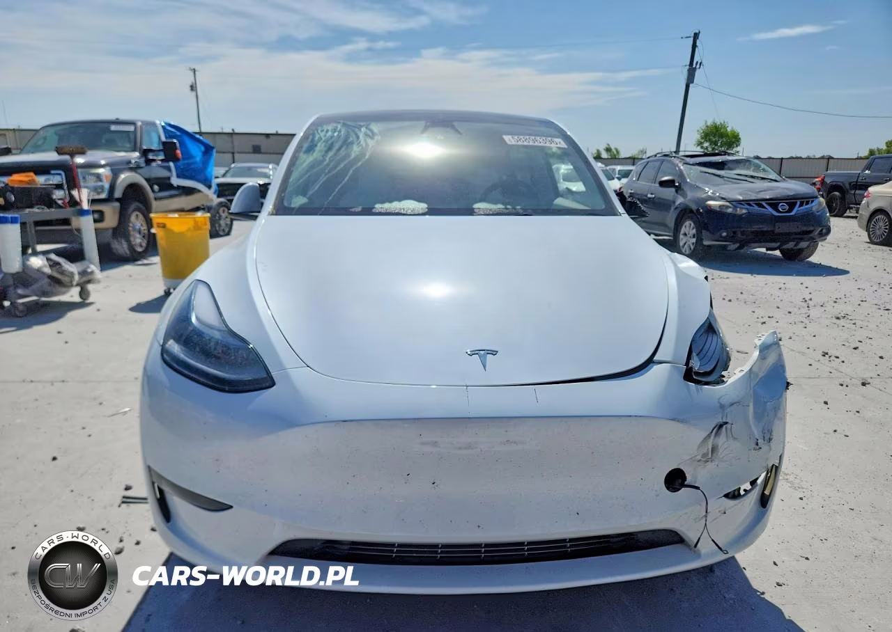2024 Tesla Model Y VIN:7SAYGDEE1RA257953 - 5
