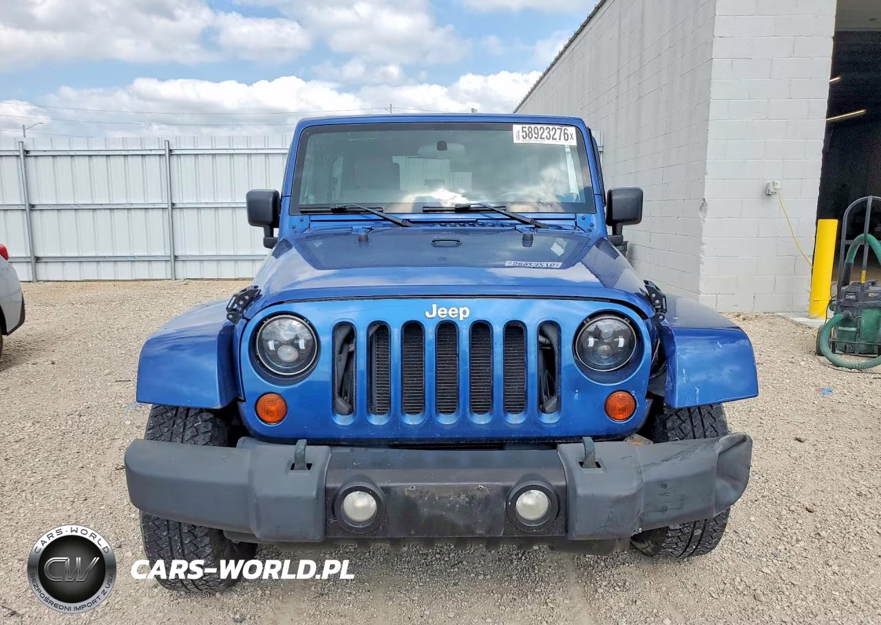 2010 Jeep Wrangler Unlimited Sahara VIN:1J4HA5H1XAL163761 - 5