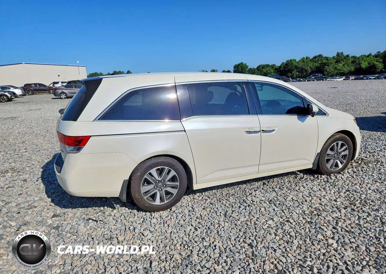 2014 Honda Odyssey Touring VIN:5FNRL5H90EB065339 - 3