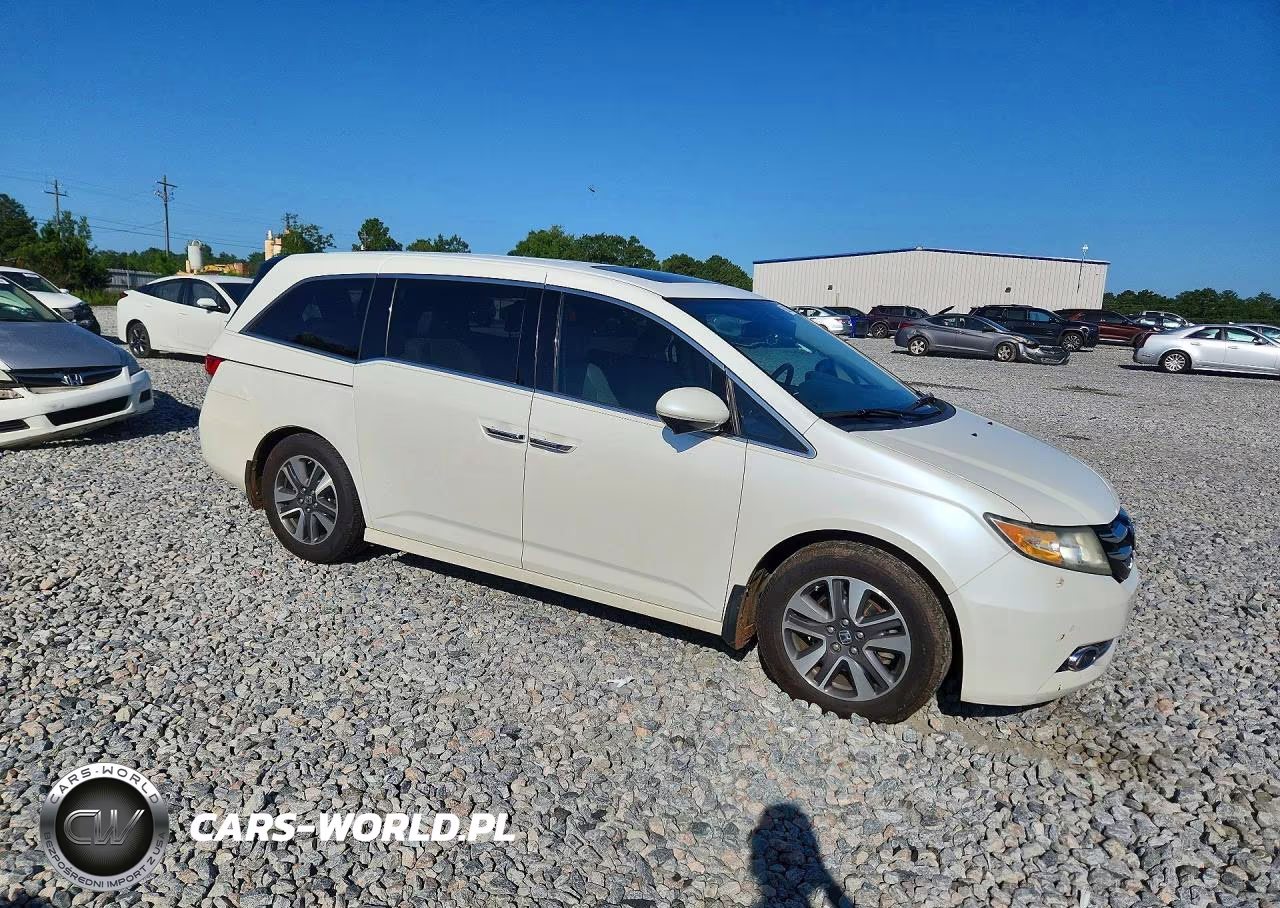 2014 Honda Odyssey Touring VIN:5FNRL5H90EB065339 - 4