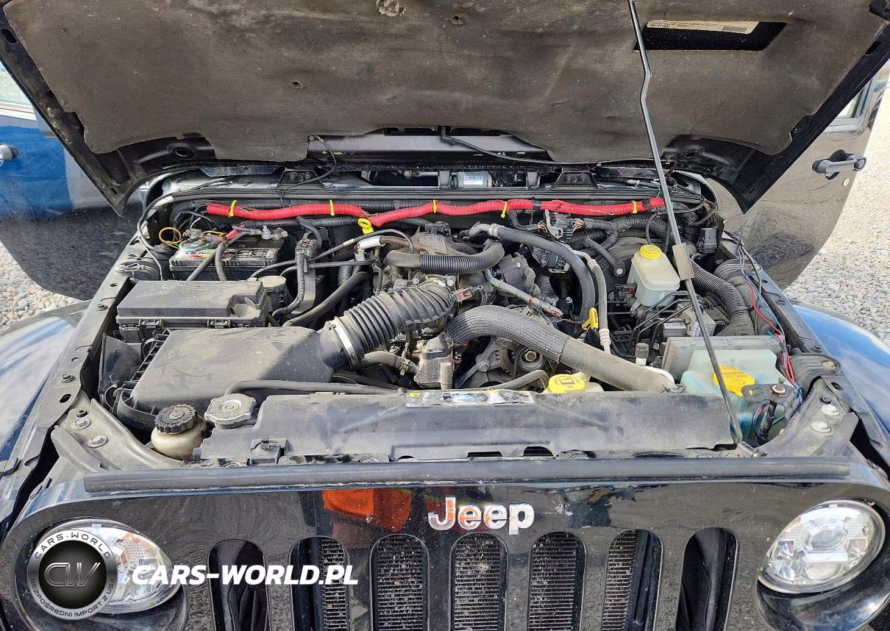 2011 Jeep Wrangler Sahara VIN:1J4AA5D1XBL593184 - 11