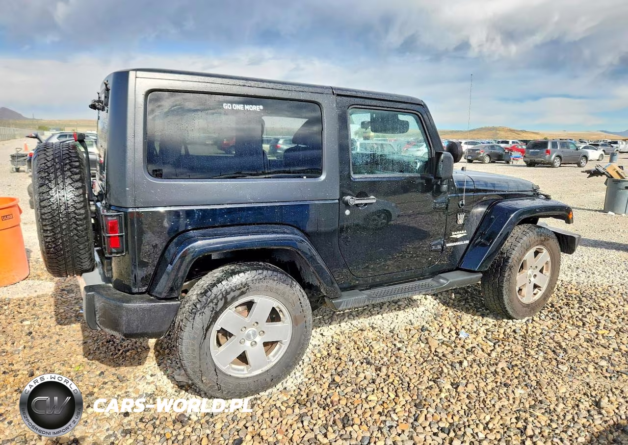 2011 Jeep Wrangler Sahara VIN:1J4AA5D1XBL593184 - 3
