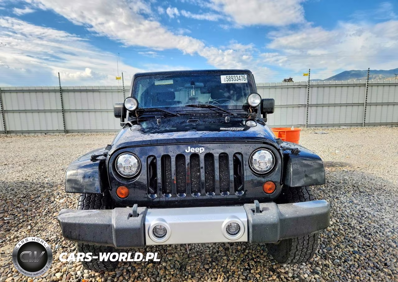 2011 Jeep Wrangler Sahara VIN:1J4AA5D1XBL593184 - 5