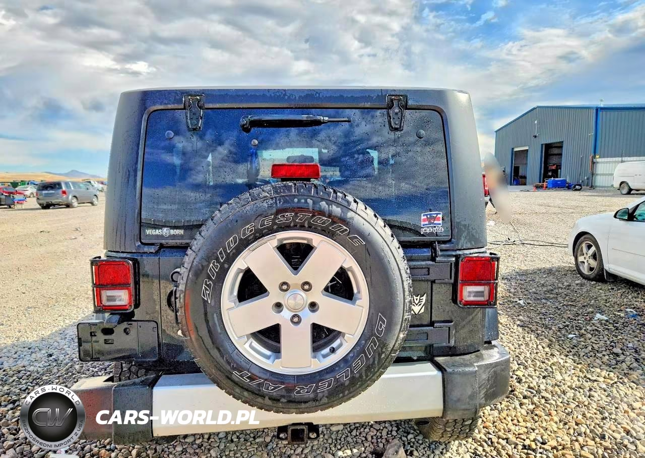 2011 Jeep Wrangler Sahara VIN:1J4AA5D1XBL593184 - 6