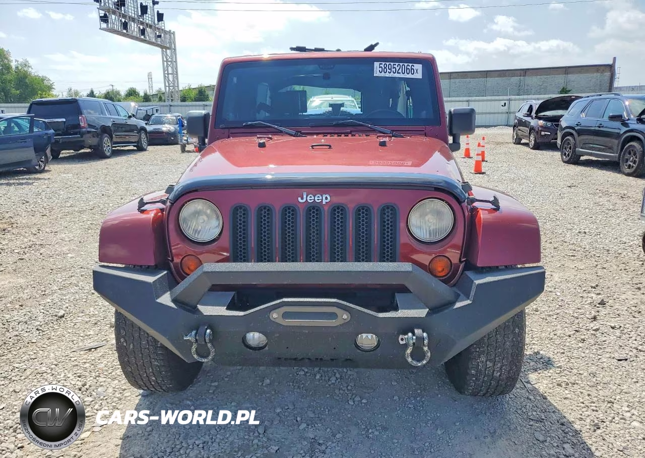 2009 Jeep Wrangler Unlimited Sahara VIN:1J4GA59179L767158 - 5