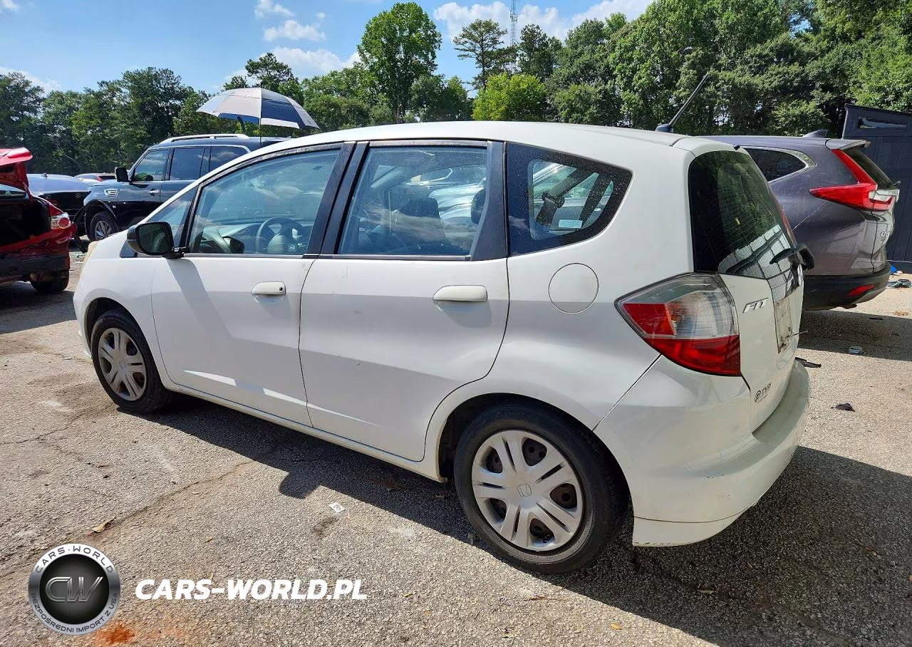 2009 Honda Fit VIN:JHMGE882X9S061036 - 2