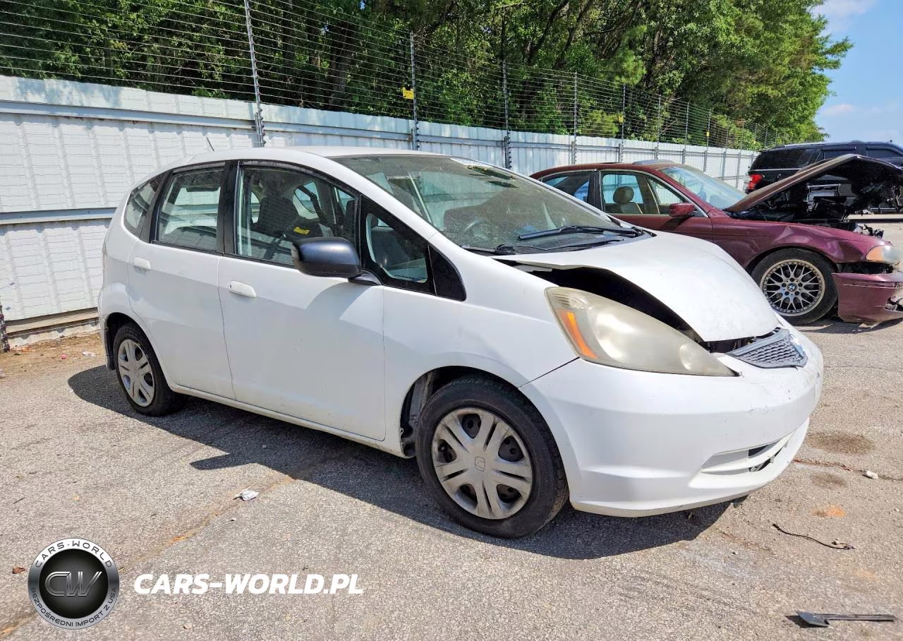 2009 Honda Fit VIN:JHMGE882X9S061036 - 4