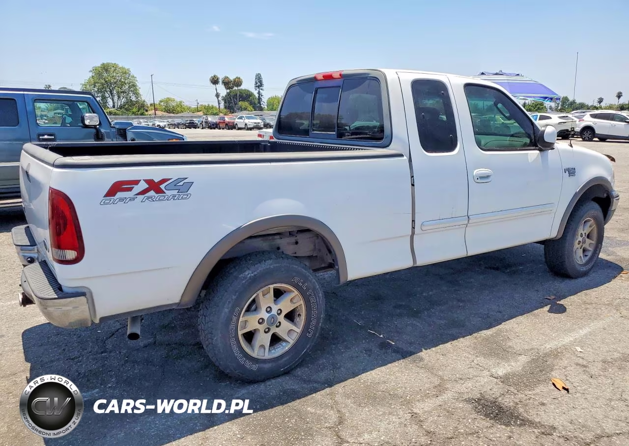 2002 Ford F150 VIN:1FTRX18L22NB14028 - 3