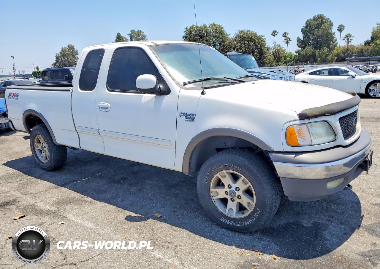 2002 Ford F150 VIN:1FTRX18L22NB14028 - 4