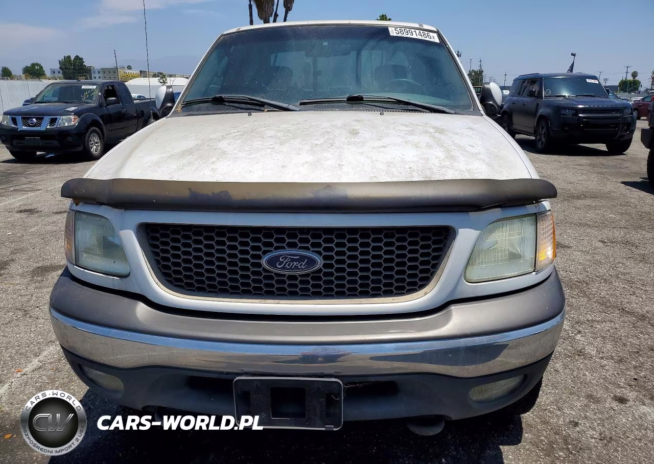 2002 Ford F150 VIN:1FTRX18L22NB14028 - 5