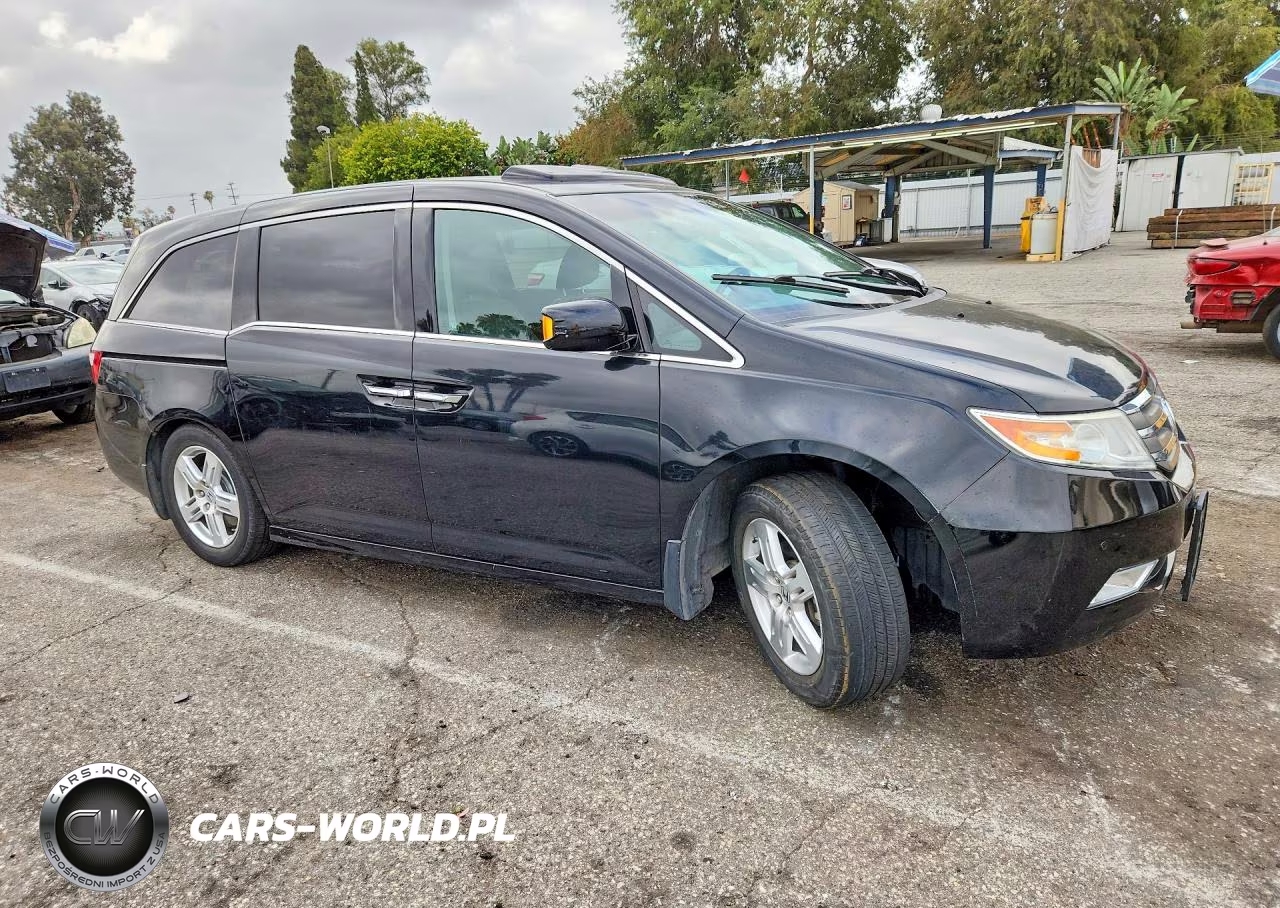 2011 Honda Odyssey Touring VIN:5FNRL5H95BB049116 - 4