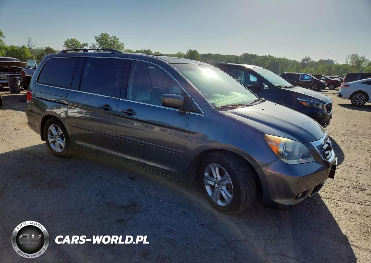 2010 Honda Odyssey Touring VIN:5FNRL3H91AB083962 - 4