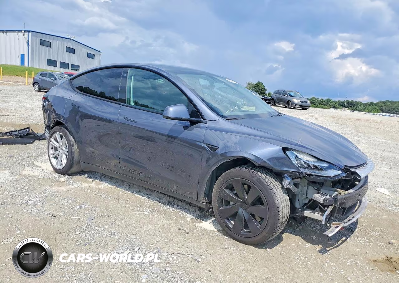 2022 Tesla Model Y VIN:7SAYGAEEXNF422300 - 4