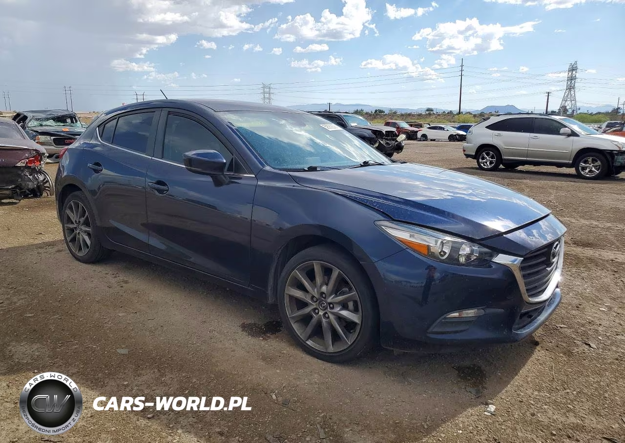 2018 Mazda 3 Touring VIN:3MZBN1L37JM261496 - 4