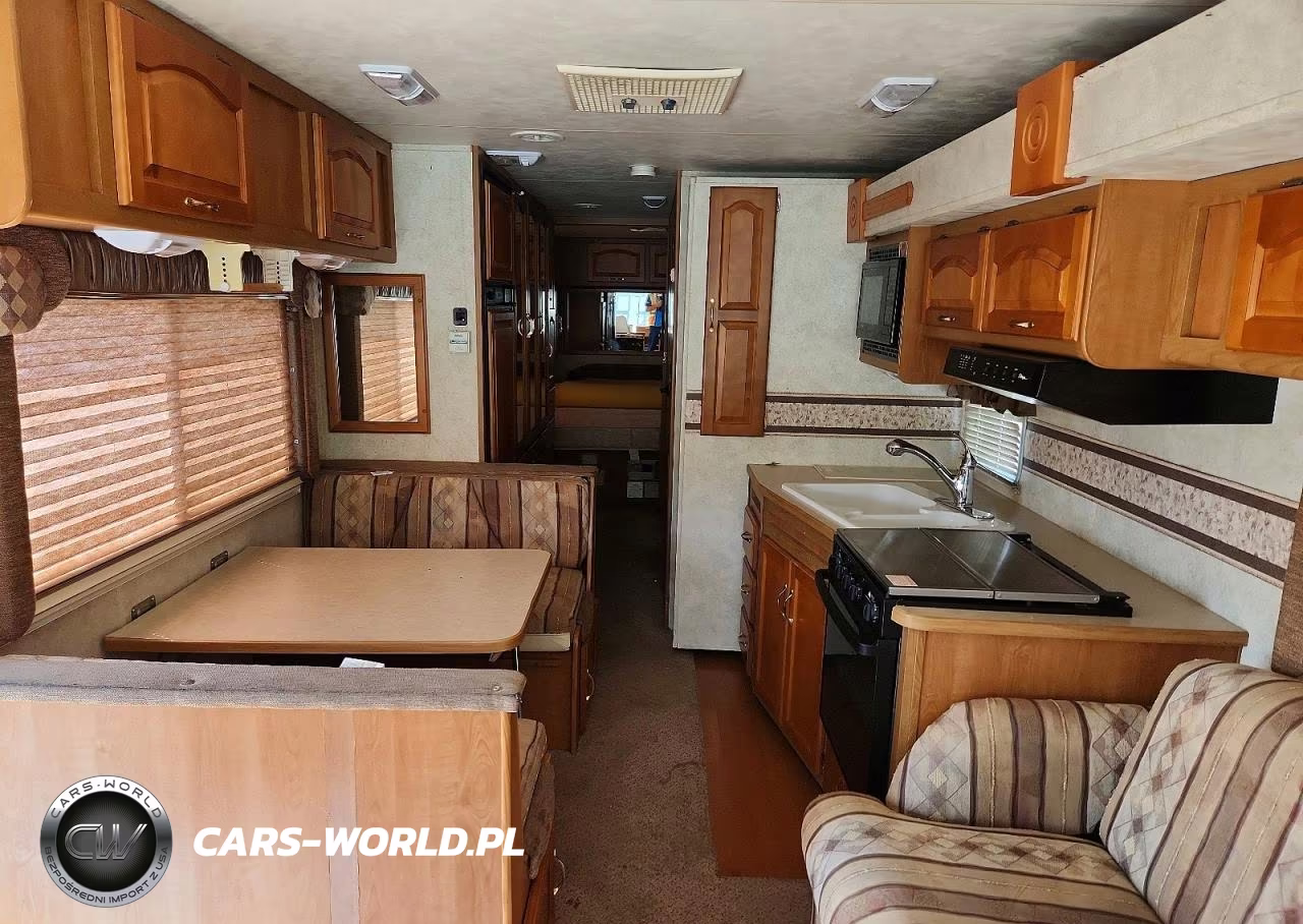 1999 Ford Challenger Rv VIN:3FCMF53S5XJA07321 - 6
