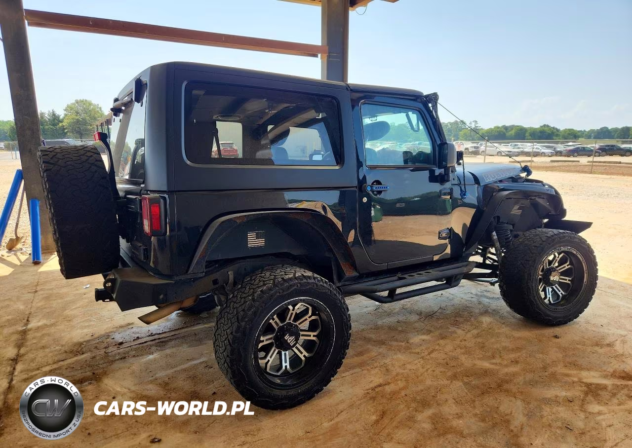 2012 Jeep Wrangler Rubicon VIN:1C4HJWCG0CL236078 - 3