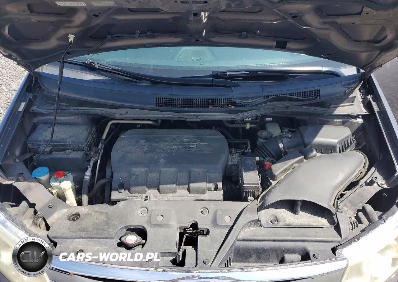 2012 Honda Odyssey Touring VIN:5FNRL5H9XCB133241 - 12