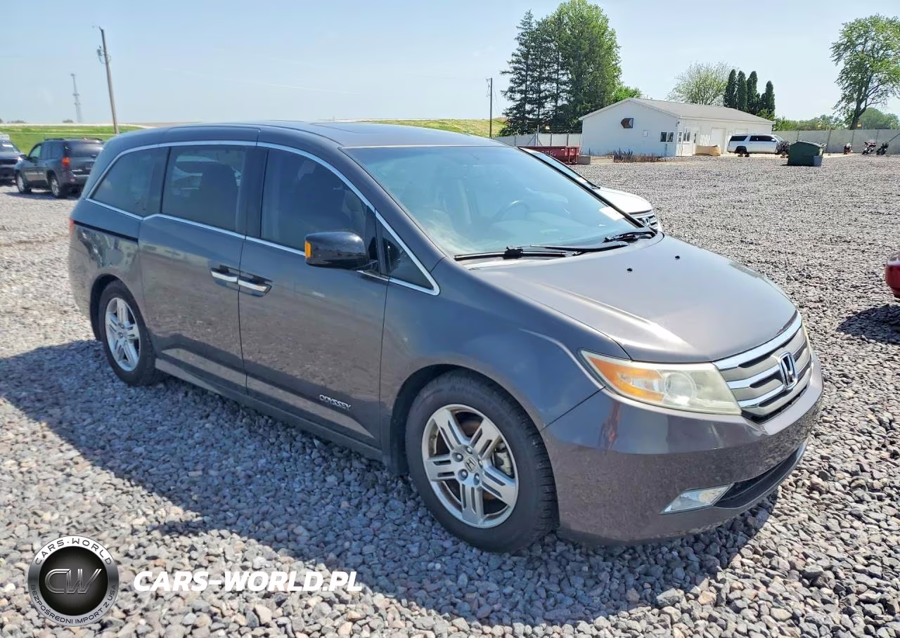 2012 Honda Odyssey Touring VIN:5FNRL5H9XCB133241 - 4