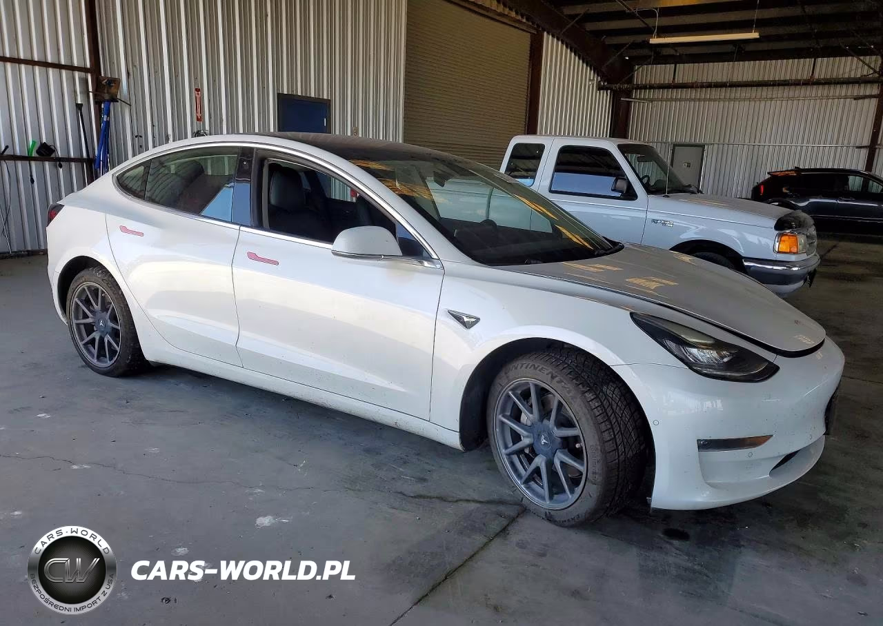 2018 Tesla Model 3 VIN:5YJ3E1EA6JF010623 - 4