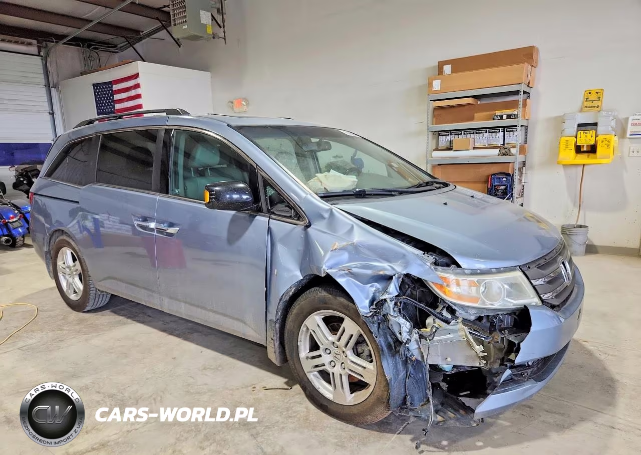 2012 Honda Odyssey Touring VIN:5FNRL5H94CB085896 - 4