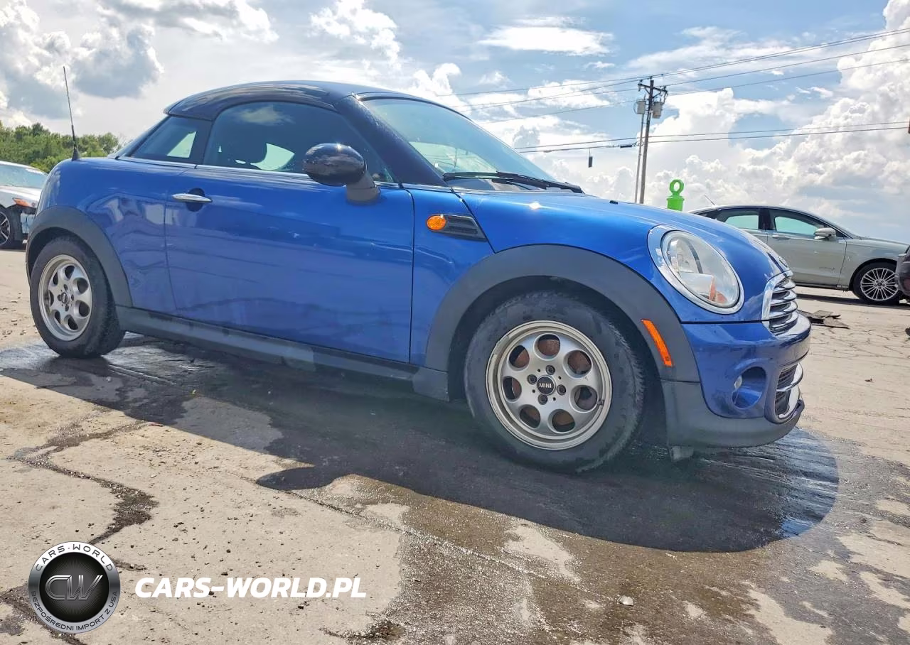 2015 Mini Cooper Coupe VIN:WMWSX1C5XFT508210 - 4
