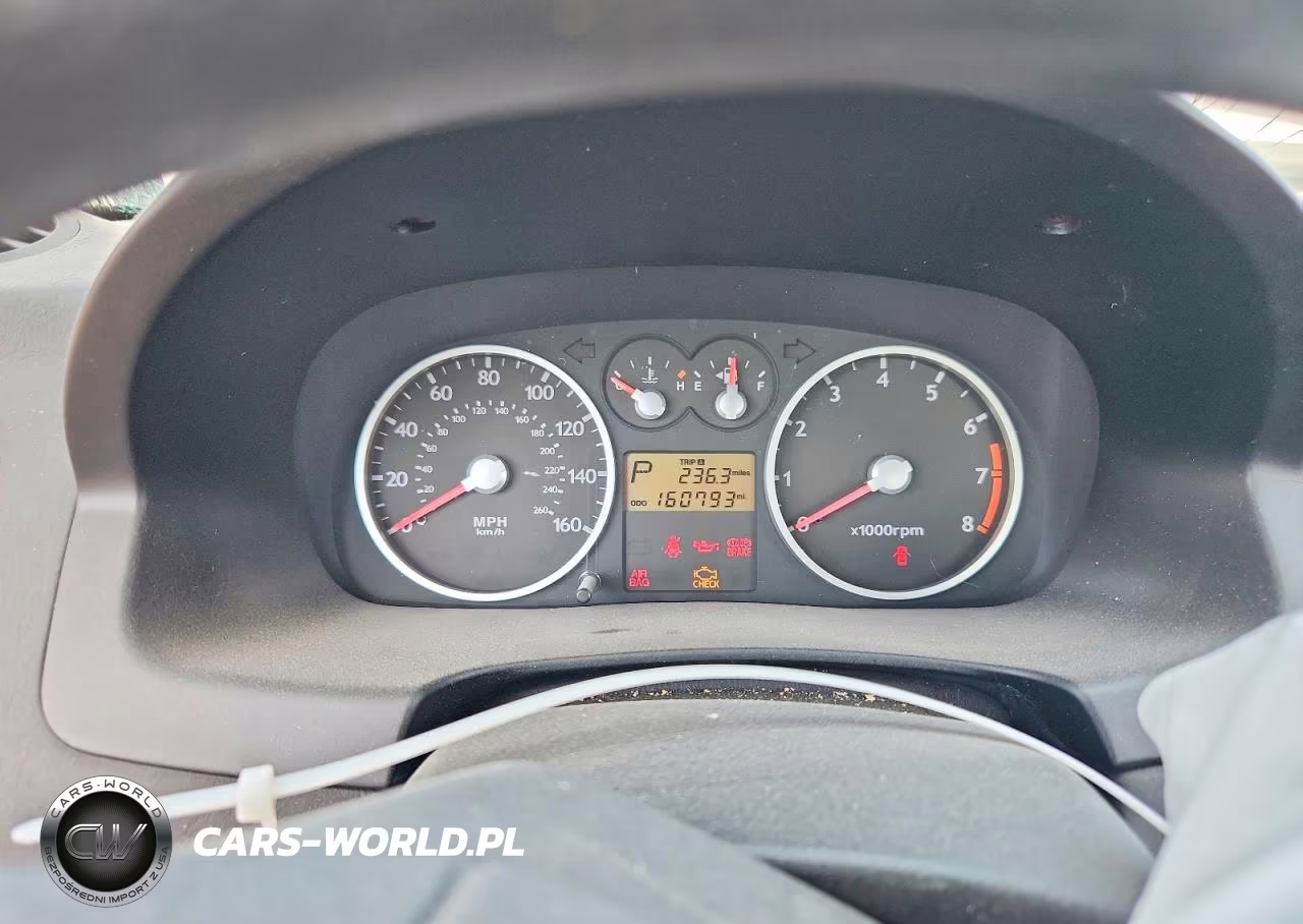 2005 Hyundai Tiburon VIN:KMHHM65D35U169091 - 9