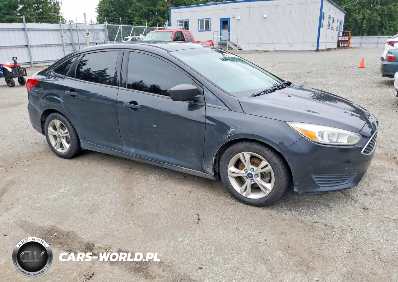 2015 Ford Focus S VIN:1FADP3E22FL334827 - 4