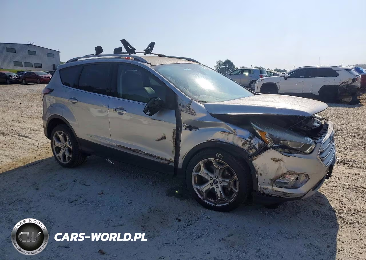 2017 Ford Escape Titanium VIN:1FMCU0J92HUD34710 - 4